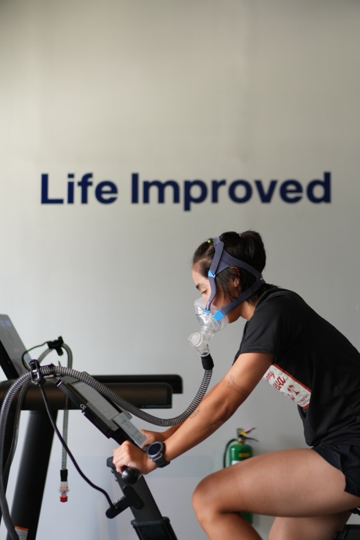 Guest training on the EWOT bike at Longevity Labs